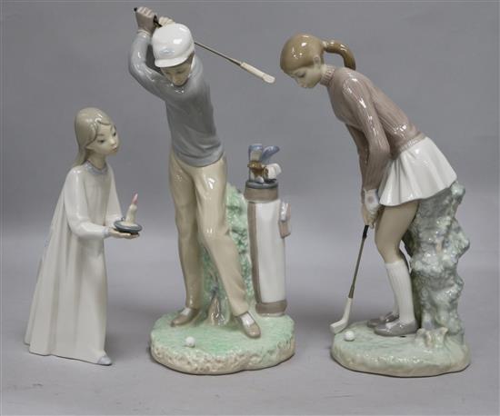 A Lladro golfers group and girl with candle